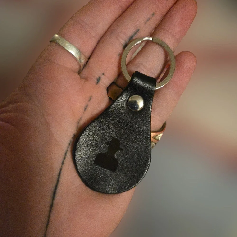 Noah Marion Austin Leather Keychain TX Black Debossed Hat Logo Silver Foil Stamp